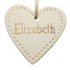 Personalised gold heart decoration.