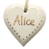 Personalised with gold heart decoration.